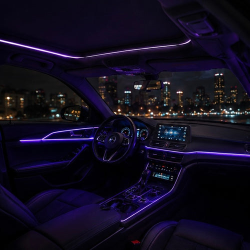 VELVOREX SkyGlow fibre optic ambient lighting running along the roofline, dashboard and door trim of a car interior at night